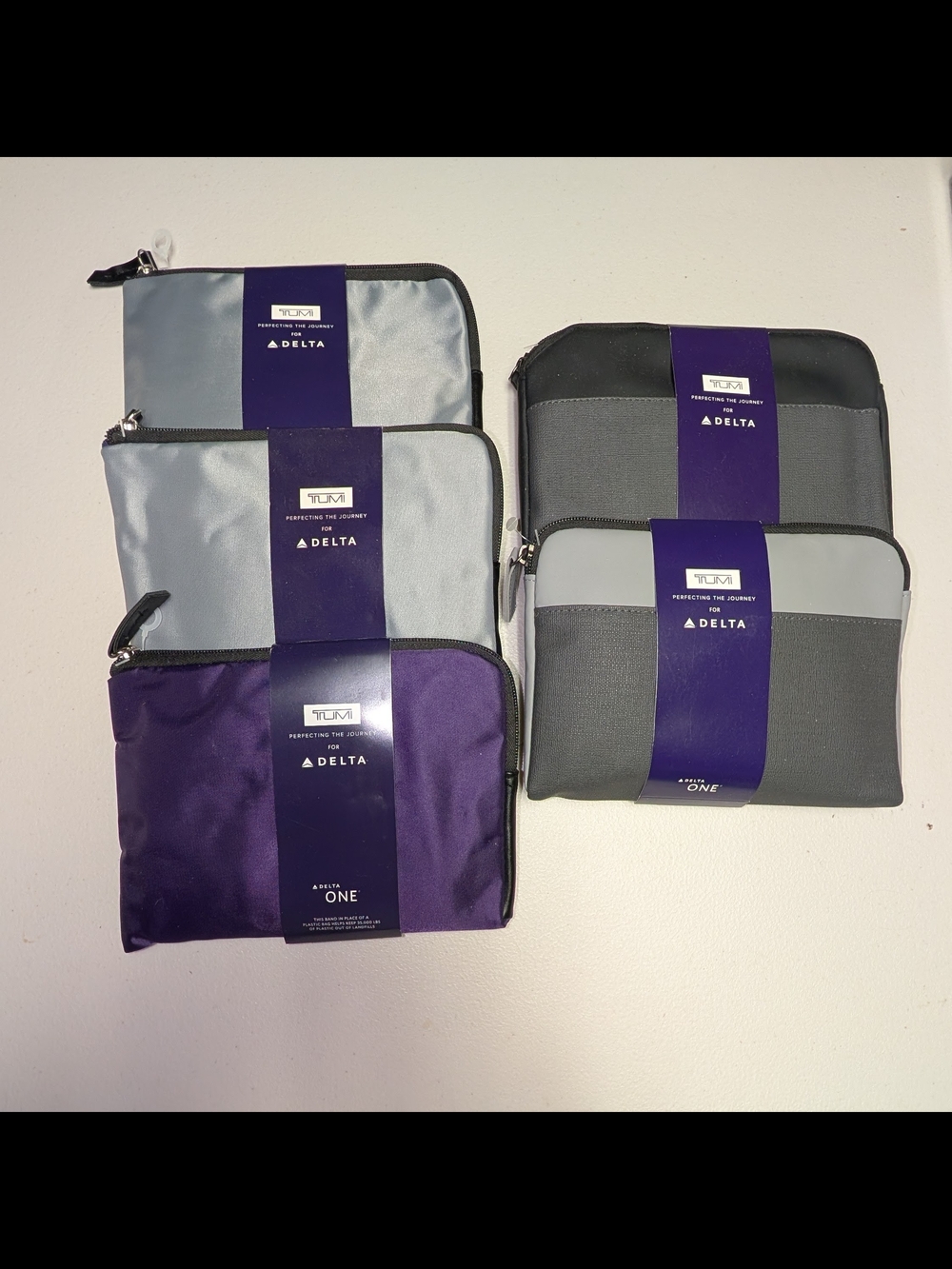 Set Of 5 Tumi First Class Toiletry Pouches in Gray, Light Gray, Purple